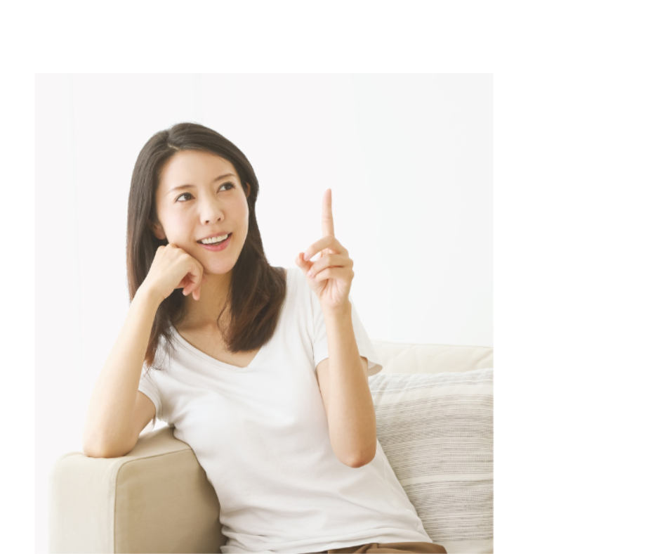 Woman smiling and pointing up