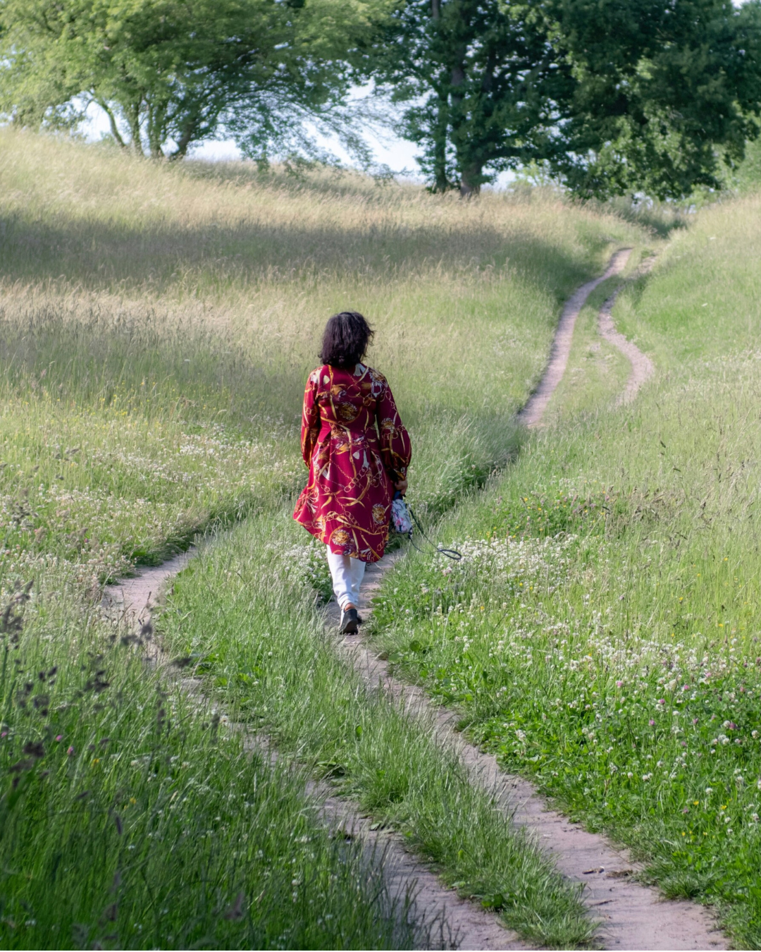 Woman walking a path