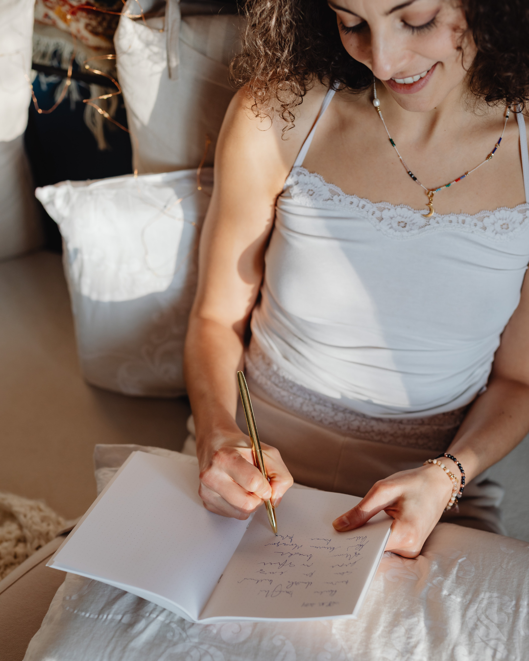 improve my self-worth woman smiling journaling