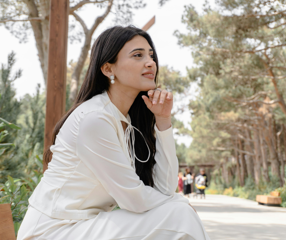 woman sitting at the park inner authority