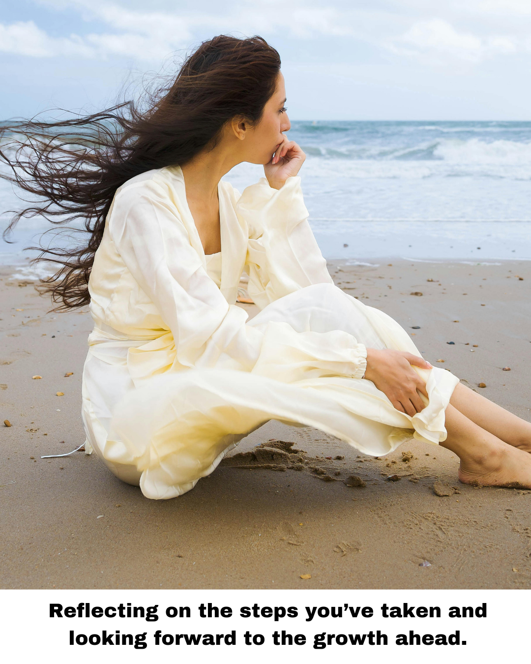woman sitting at the beach