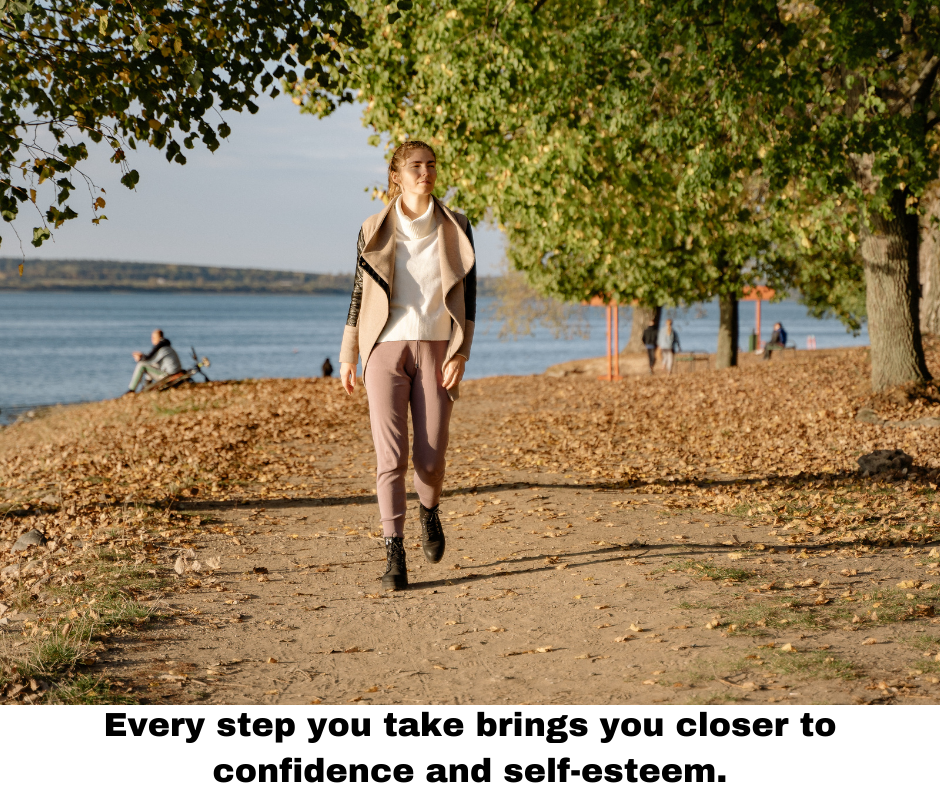 woman walking path lake self-esteem journey